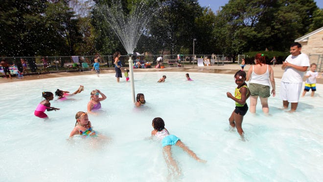 Kids cool off at the Humboldt Park wading pool.