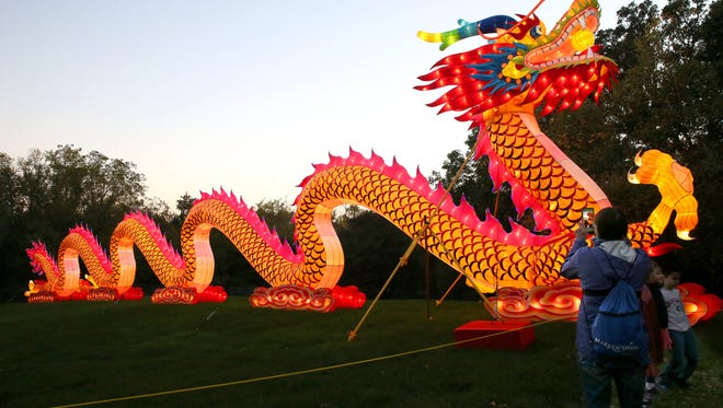 Everyone wants a photo of the dragon at the China Lights display at Boerner Botanical Gardens. The 200-foot-long dragon is a crowd favorite.