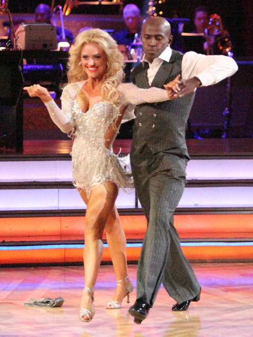 Former Green Bay Packers wide receiver Donald Driver, right, and his partner Peta Murgatroyd perform on the celebrity dance competition series "Dancing with the Stars," in Los Angeles in 2012. Driver and Murgatroyd won the competition.