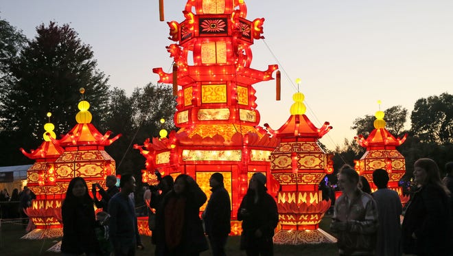 The palace lanterns attracts a crowd around dusk at the China Lights display at Boerner Botanical Gardens.
