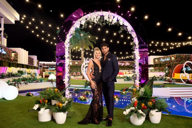 Wisconsin native Carmen Kocourek, 22, and Kenzo Nudo, 26, pose for a photo in the "Love Island USA" villa on the final night of the show. The couple finished in fourth place on the reality dating show in summer 2023.