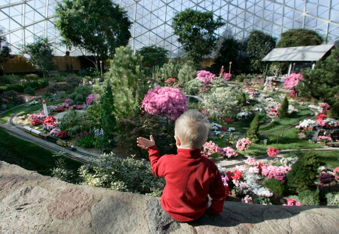 Nathan Safranek (3) of Pewaukee, waves as a model train passes by while enjoying the train show at the Mitchell Park Domes on February 8, 2007.