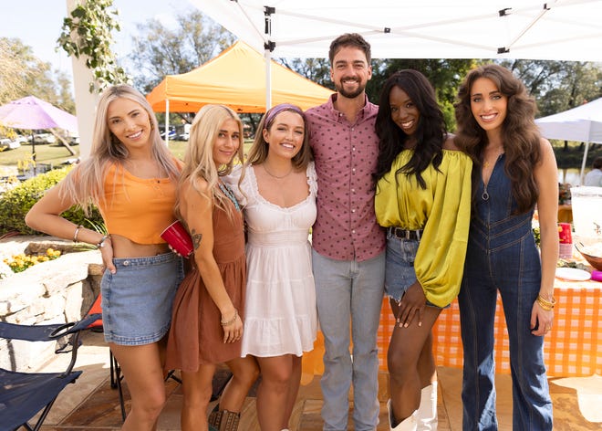 Caledonia woman Grace Girard (middle) is part of a group looking to win the heart of Brandon Rogers on season 2 of "Farmer Wants a Wife." She and her fellow daters had a "mixer" with Rogers at a Clemson football game away from the farm on the third episode that aired Thursday, Feb. 15, 2024.