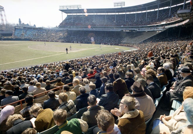 Fans enjoy the game in the lower grandstand along the third base line during the Brewers' first opening day on April 7, 1970. The game was also the season opener for the Brewers. A crowd of 37,237 saw the Brewers fall to the California Angels 12-0.