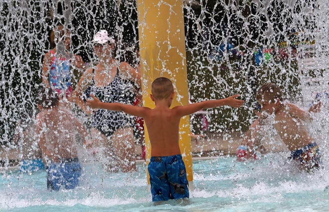 Youngsters frolic in the Cool Waters aquatic center in West Allis in this 2016 file photo. The water park will not open in 2022 due to funding and staffing shortages, Milwaukee County officials said.
